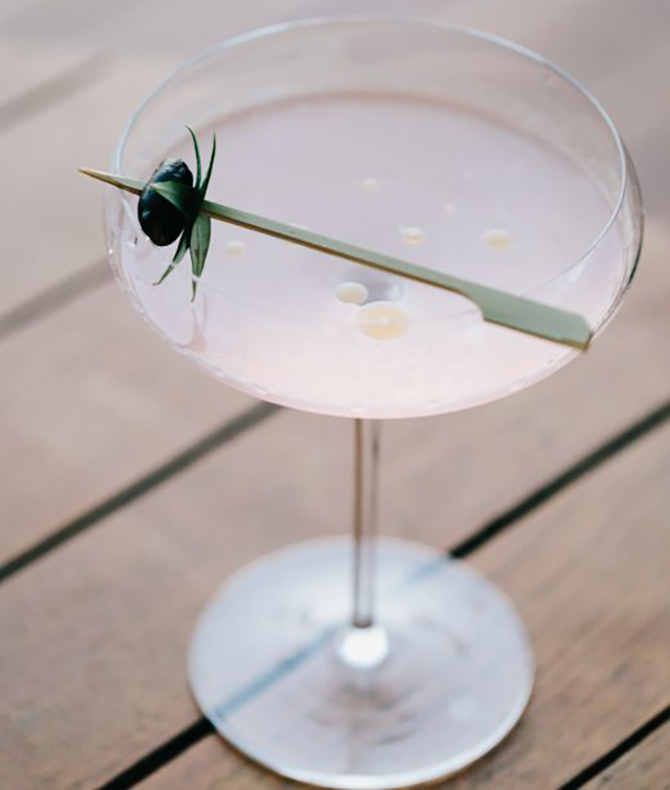 Olive Oil Martini  with olive spoon sweet 